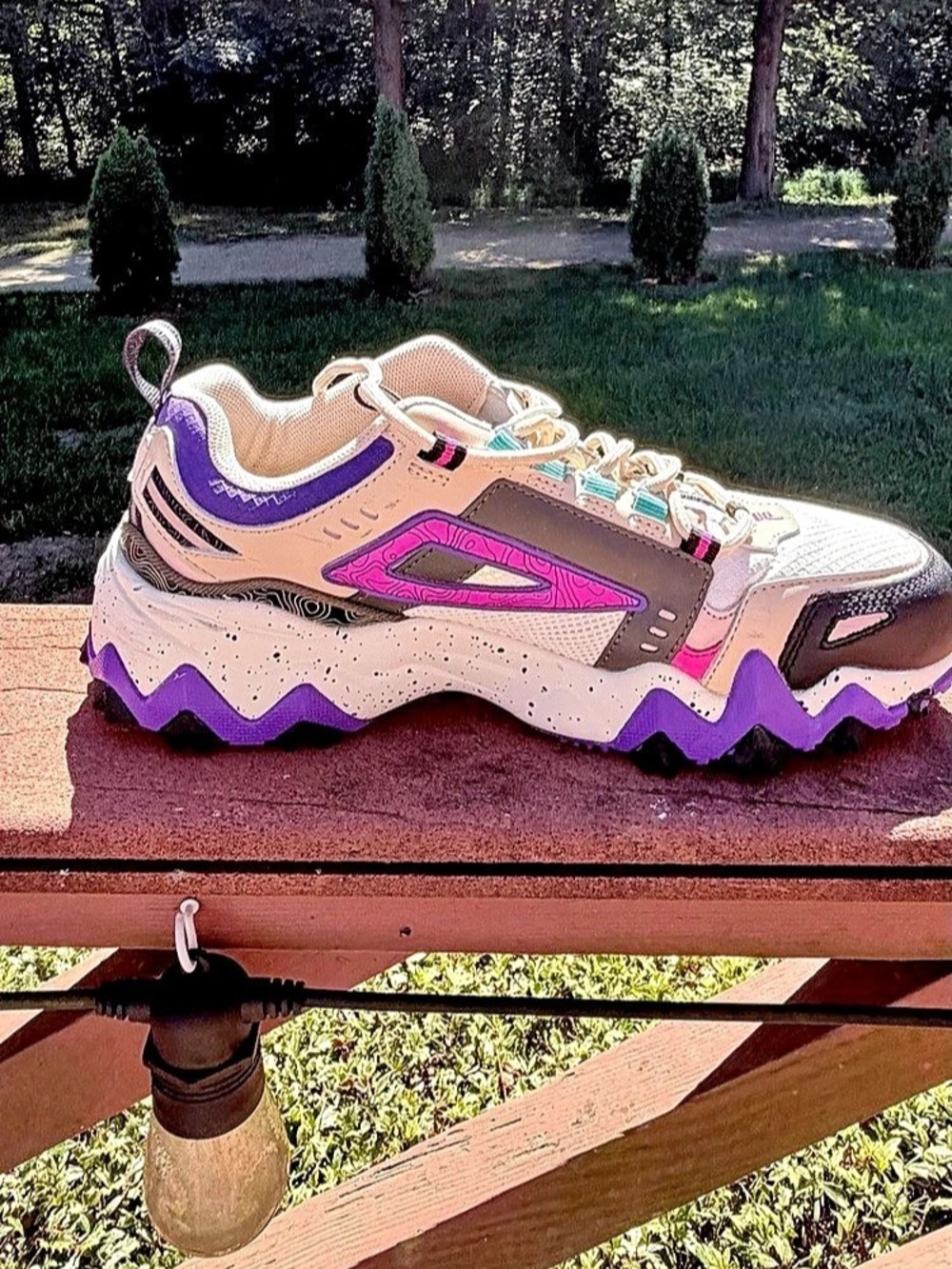 Fila Women's Oakmont TR Sneakers in the Gardenia/Thyme/Electric Purple colorway.